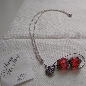 Silver tone capped simulated red, amber bead balls heat pendant